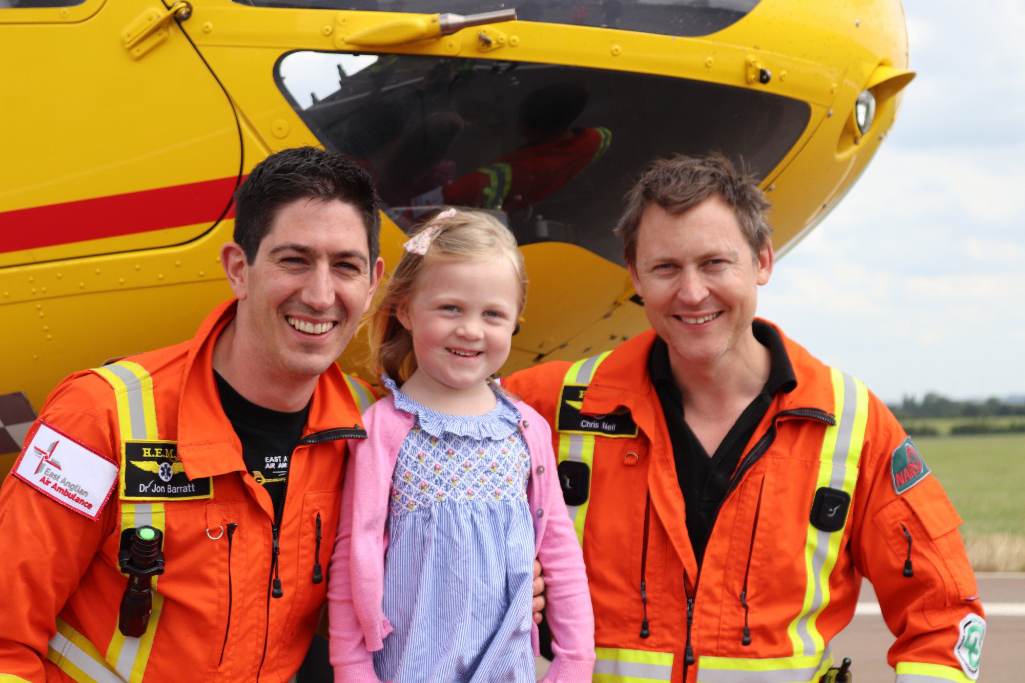 Annabel with Dr Jon Barratt and CCP Chris Neil in front of the EAAA helicopter.