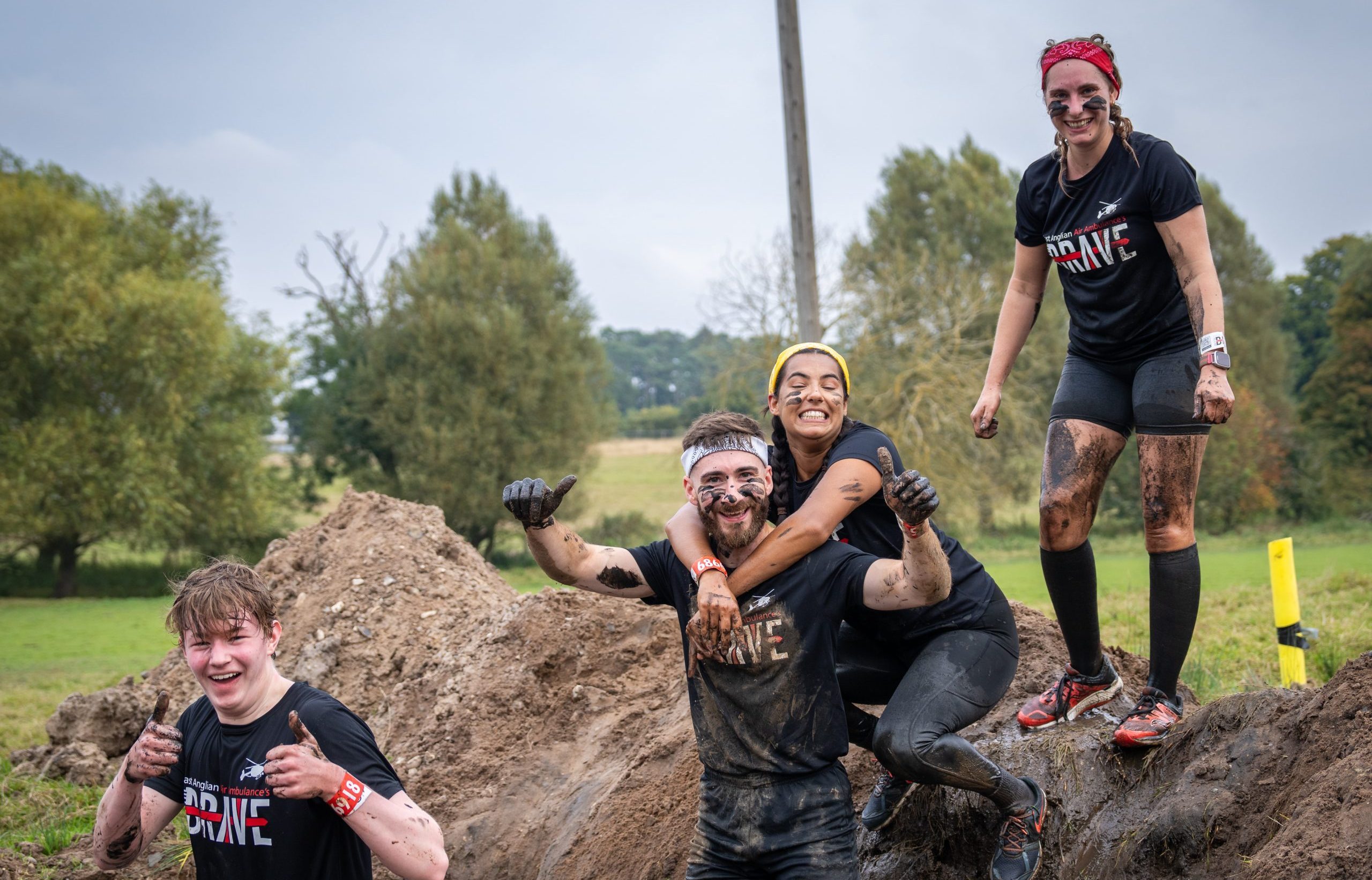 Thumbs up in the mud at only the brave