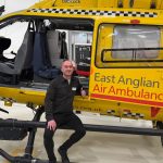 Marathon runner Luke with helicopter