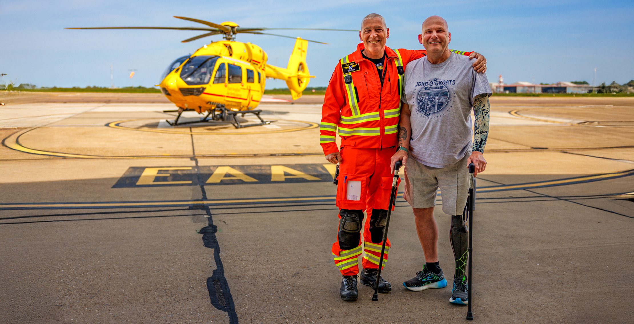 Rod and Keith in front of helicopter
