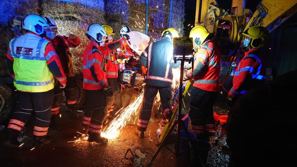 Jonathan being cut free by the fire and rescue service