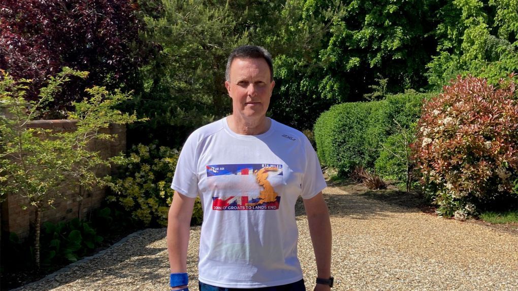Former patient Dan Gilkes wearing his John O’Groats to Land’s End running challenge t-shirt