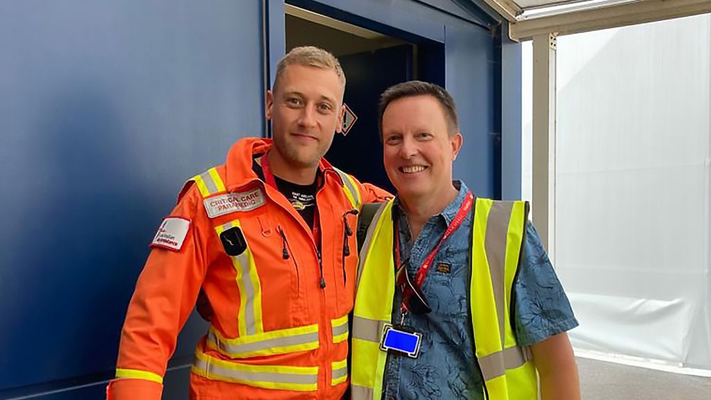 Former patient Dan Gilkes meeting Critical Care Paramedic Joe during a base visit