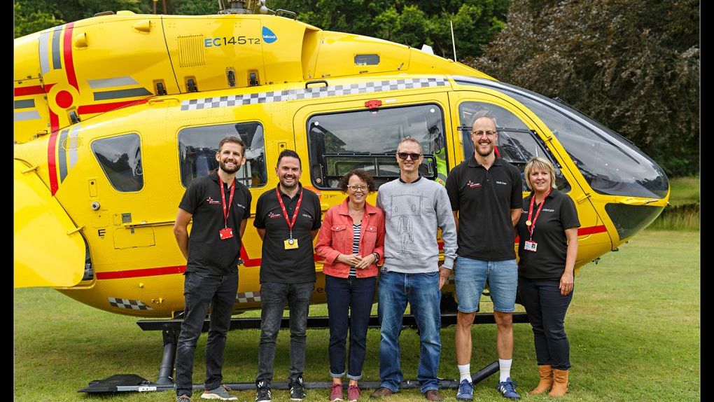 EAAA patient Dave Cleland and his wife Bernie with EAAA staff