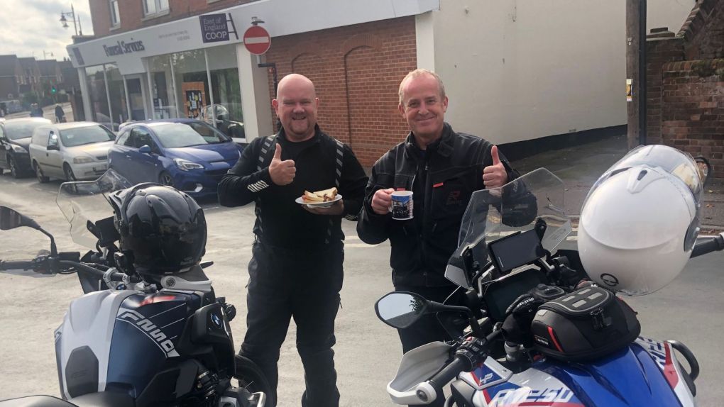 Keith and Andy with their motorcycles.