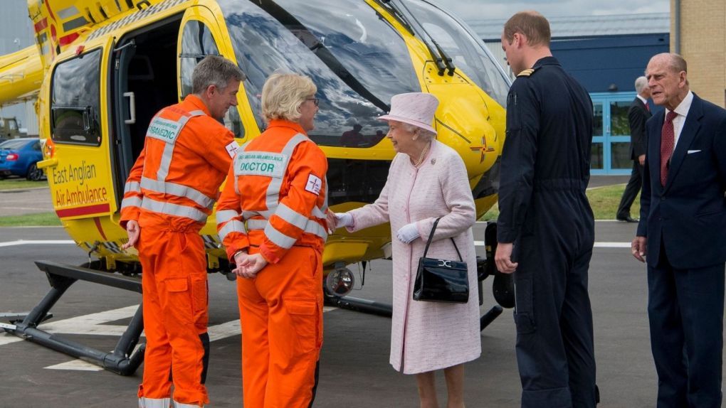 Mark Milsom Shakes hands with the Queen