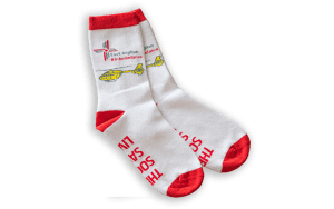 White and red adult's sock with EAAA helicopter laid flat, side by side, showing right side