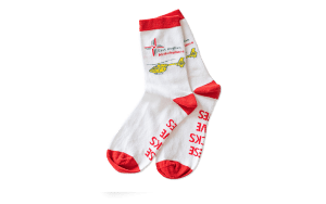 White and red adult's sock with EAAA helicopter laid flat, side by side, showing left side
