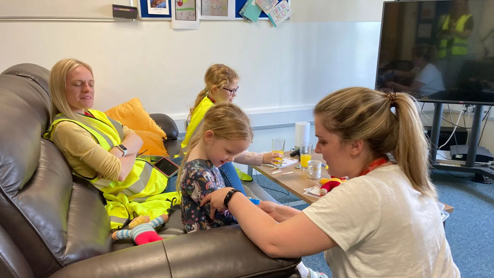 Hayley Bellchambers and her family with EAAA's Aftercare team.