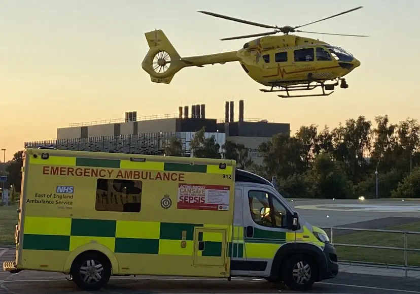 helicopter landing near road ambulance