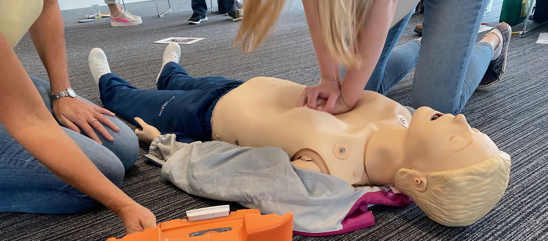 Person delivers chest compressions