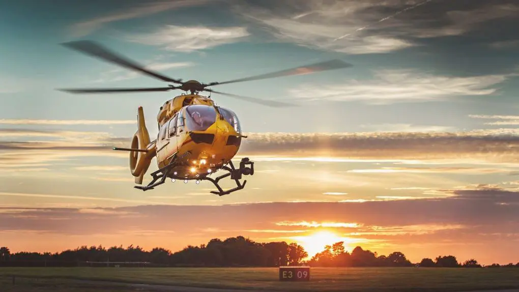 EAAA Helicopter landing at sunset
