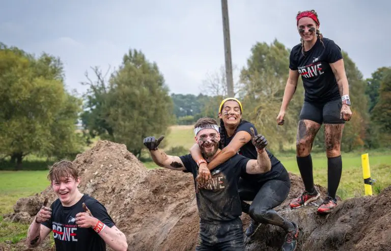 Thumbs up in the mud at only the brave