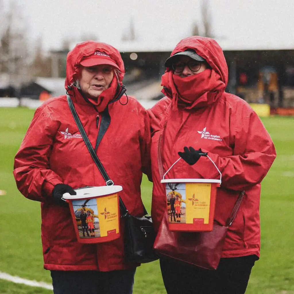 Emma and Jane with collection buckets