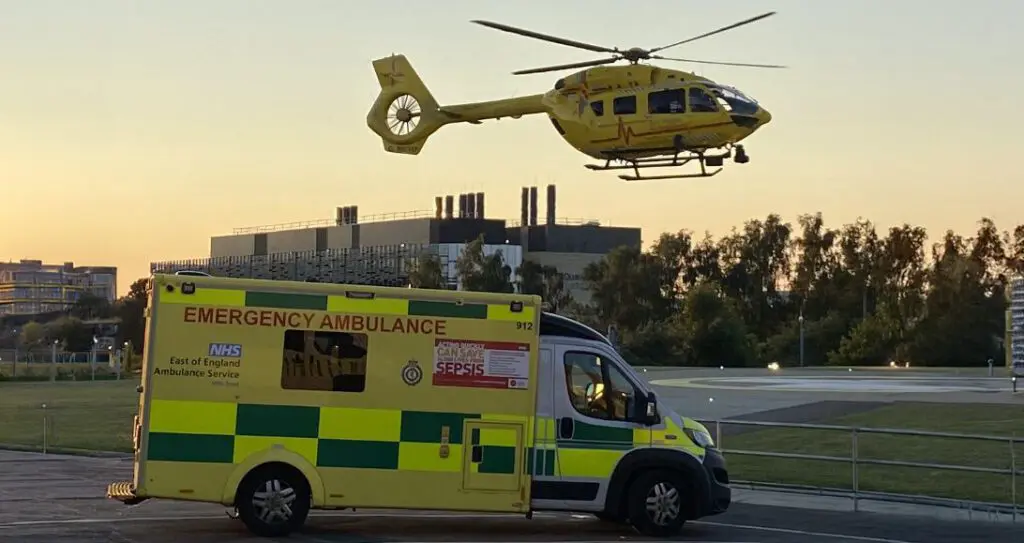 helicopter landing near road ambulance