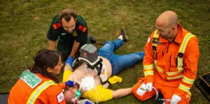 Paramedics treating patient