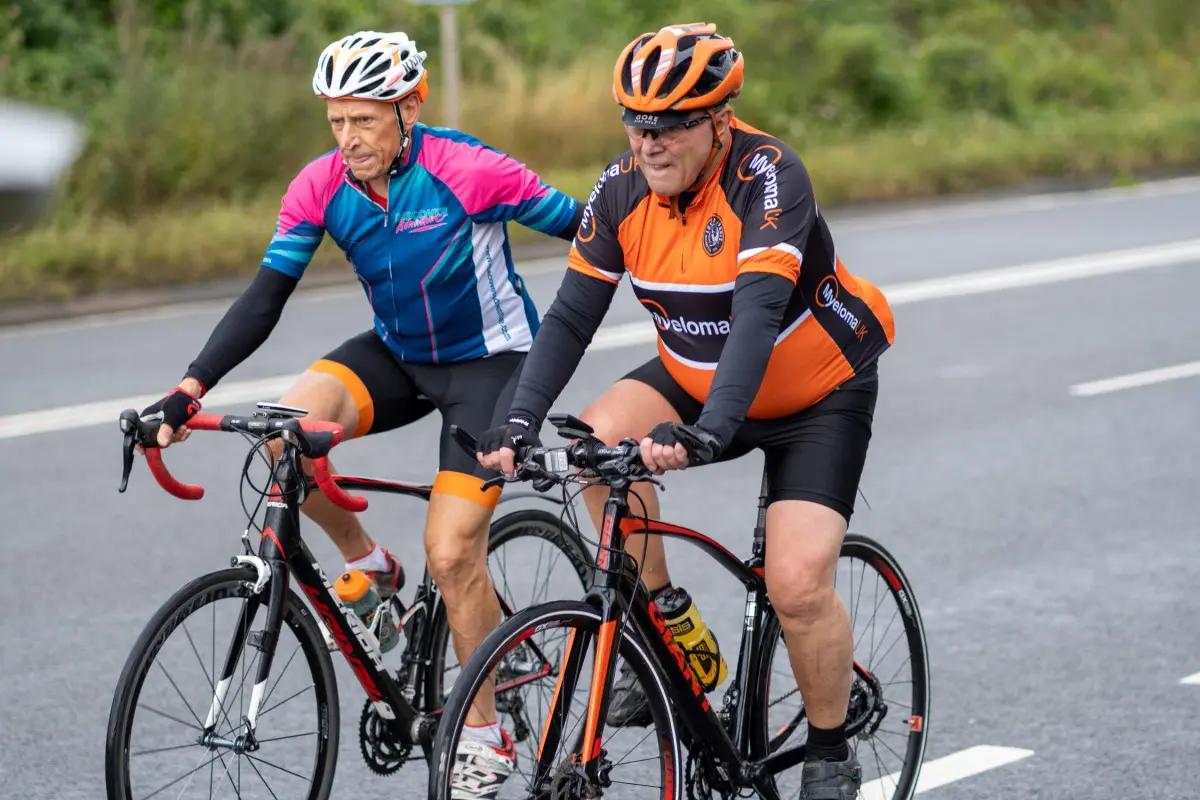 cyclists encouraging each other