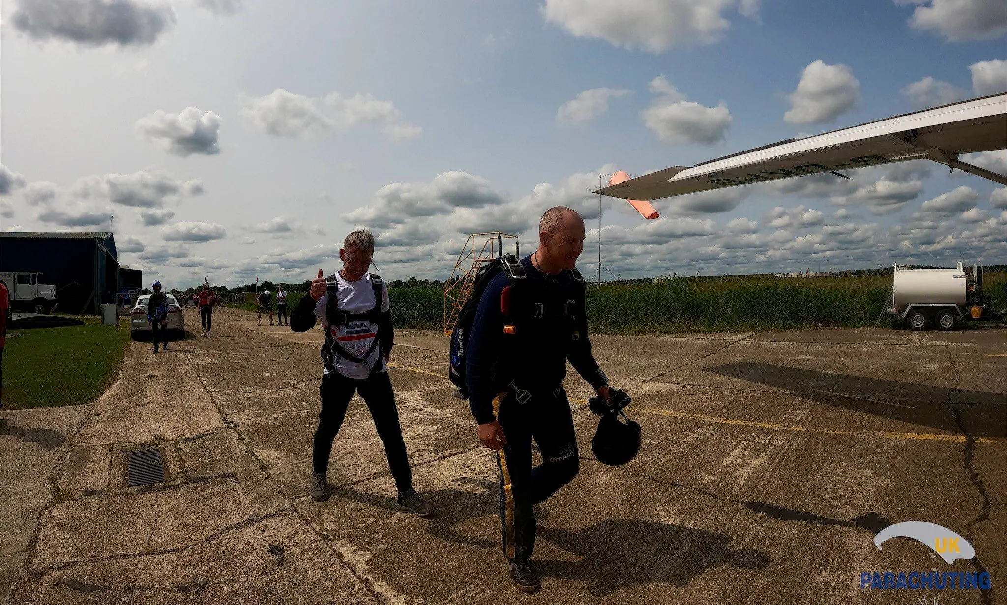 sky diver walking to plane for big leaaap
