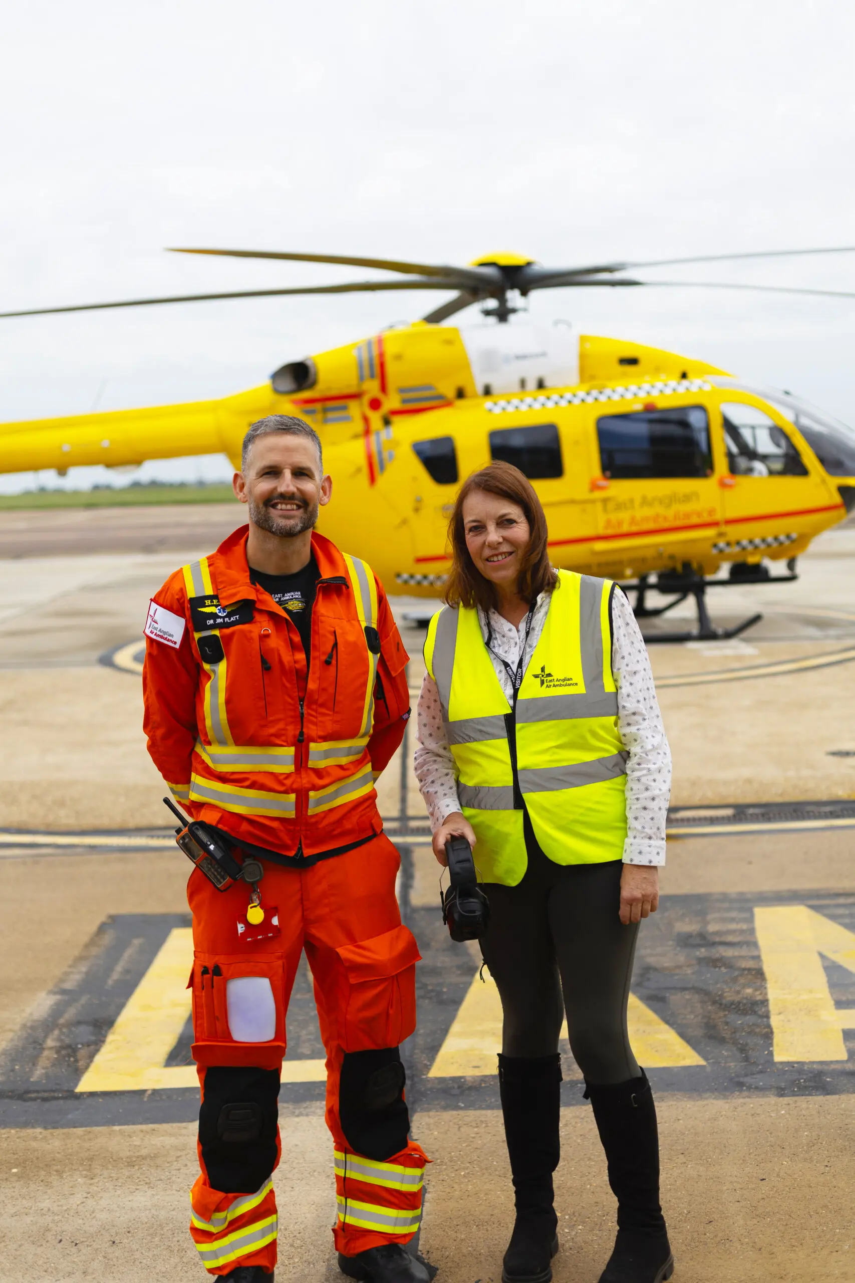 jane with crew infront of helicopter