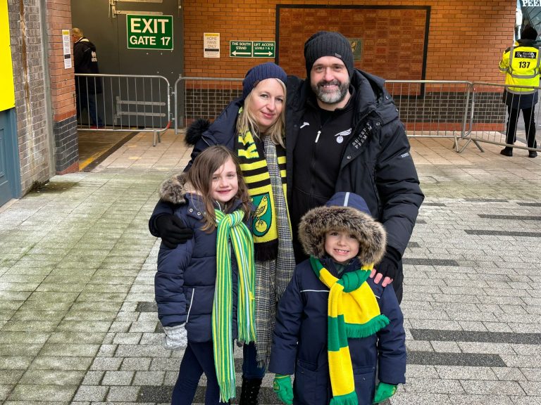 Andy Wall and his family returning to Carrow Rd after his cardiac arrest.