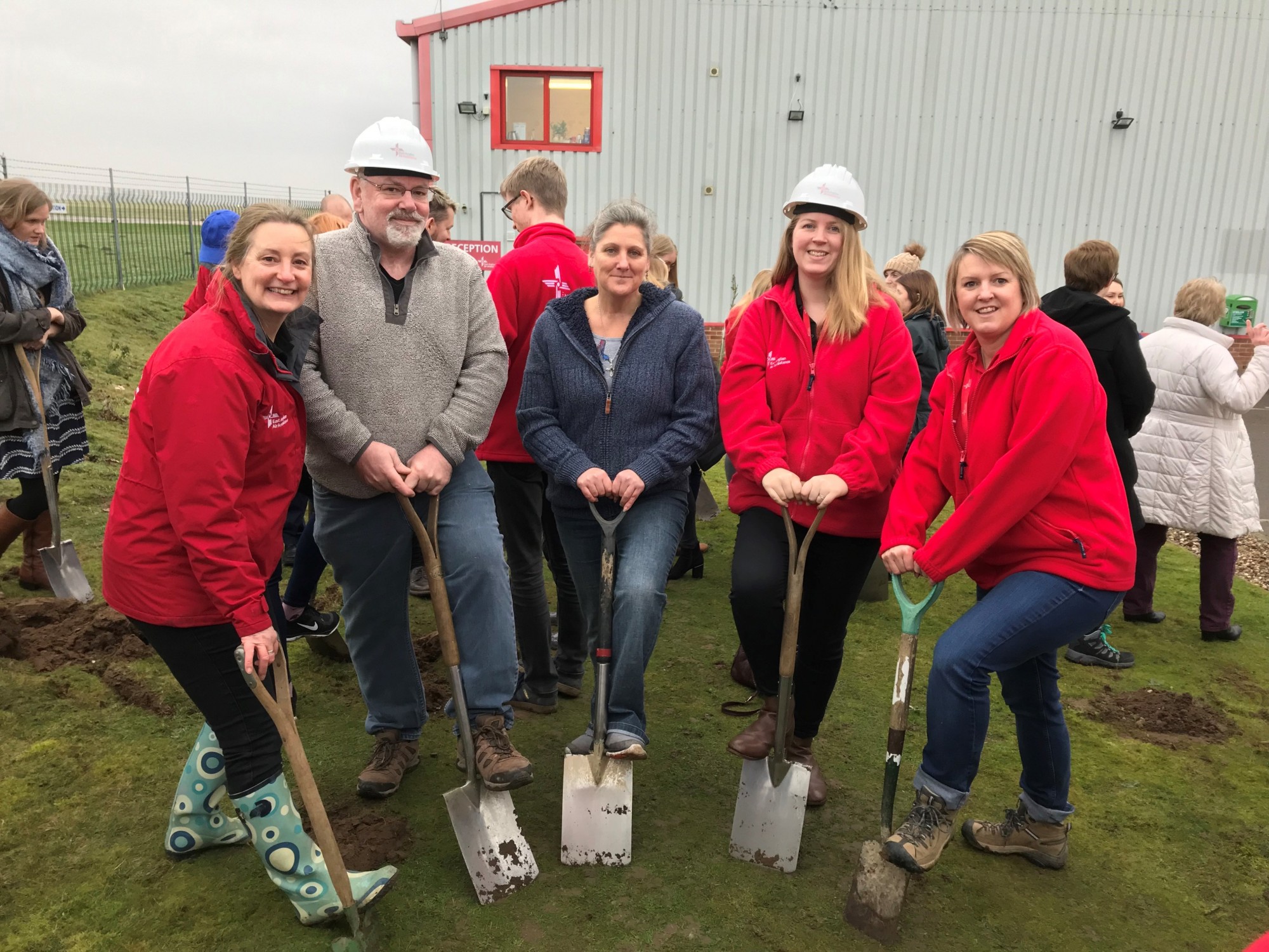 Simon Thomas with members of the EAAA Aftercare team at the site for the new EAAA Norwich base, Helimed House.