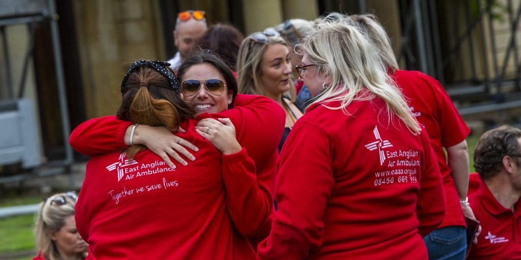 EAAA Staff Hugging at Staff day