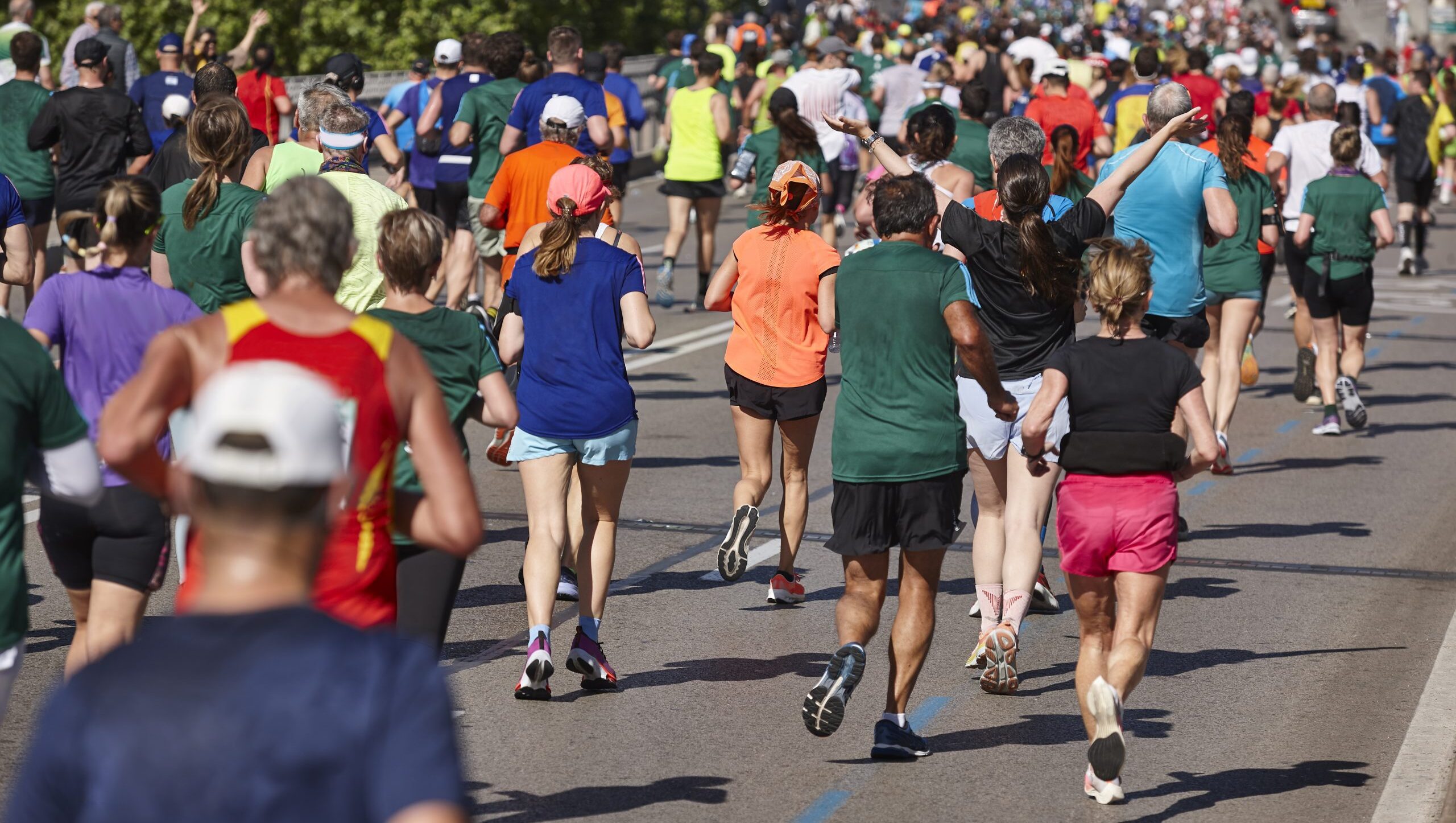Runners on the street. Healthy lifestyle. Jogging exercise.