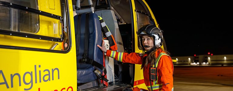 Dr Meg getting into helicopter