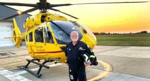 Pilot Dave in front of Helicopter