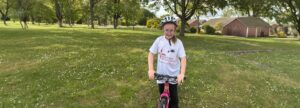 Phoebe with her pink bike