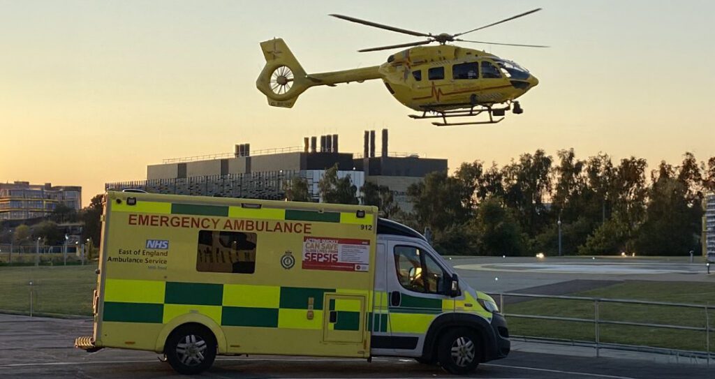 helicopter landing near road ambulance