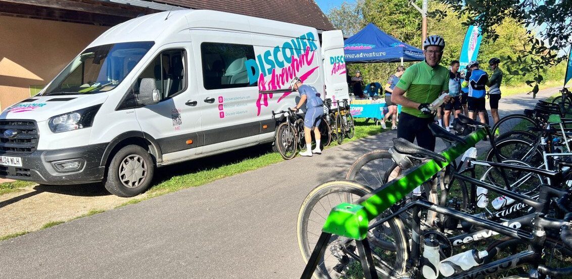 Discover Adventure van with bikes parked