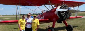 Wing walkers infront of plane