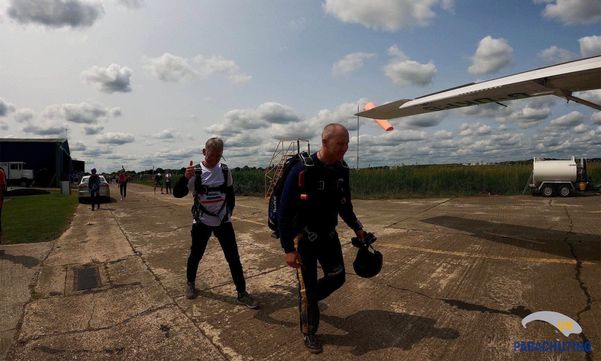 sky diver walking to plane for big leaaap